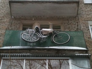 хранение велосипеда на открытом балконе